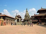 
Bhaktapur (1401m) is a traffic-free city 13 km east of Kathmandu, with cobblestone streets linking a string of temples, courtyards and squares. Bhaktapur Durbar Square is one of the world heritage sites in Nepal, reflecting the city's rich culture, art and architectural design. The Golden Gate, or Sun Dhoka, in Bhaktapur’s Durbar Square is actually made of brass, and is one of the most important pieces of art in the whole Kathmandu Valley. The gate is the entrance to the main courtyard of the 55 Window Palace. The gate and palace were built by King Bhupatindra Malla but were not completed until 1754.
